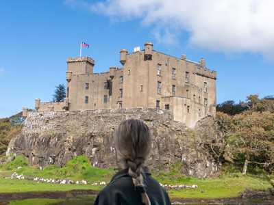 Female Traveller admiring views of Dunvegan Castle