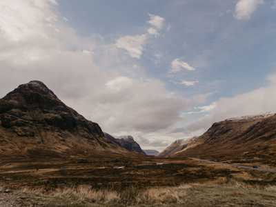 Great Glen on a gloomy day, with rolling green hills under overcast skies