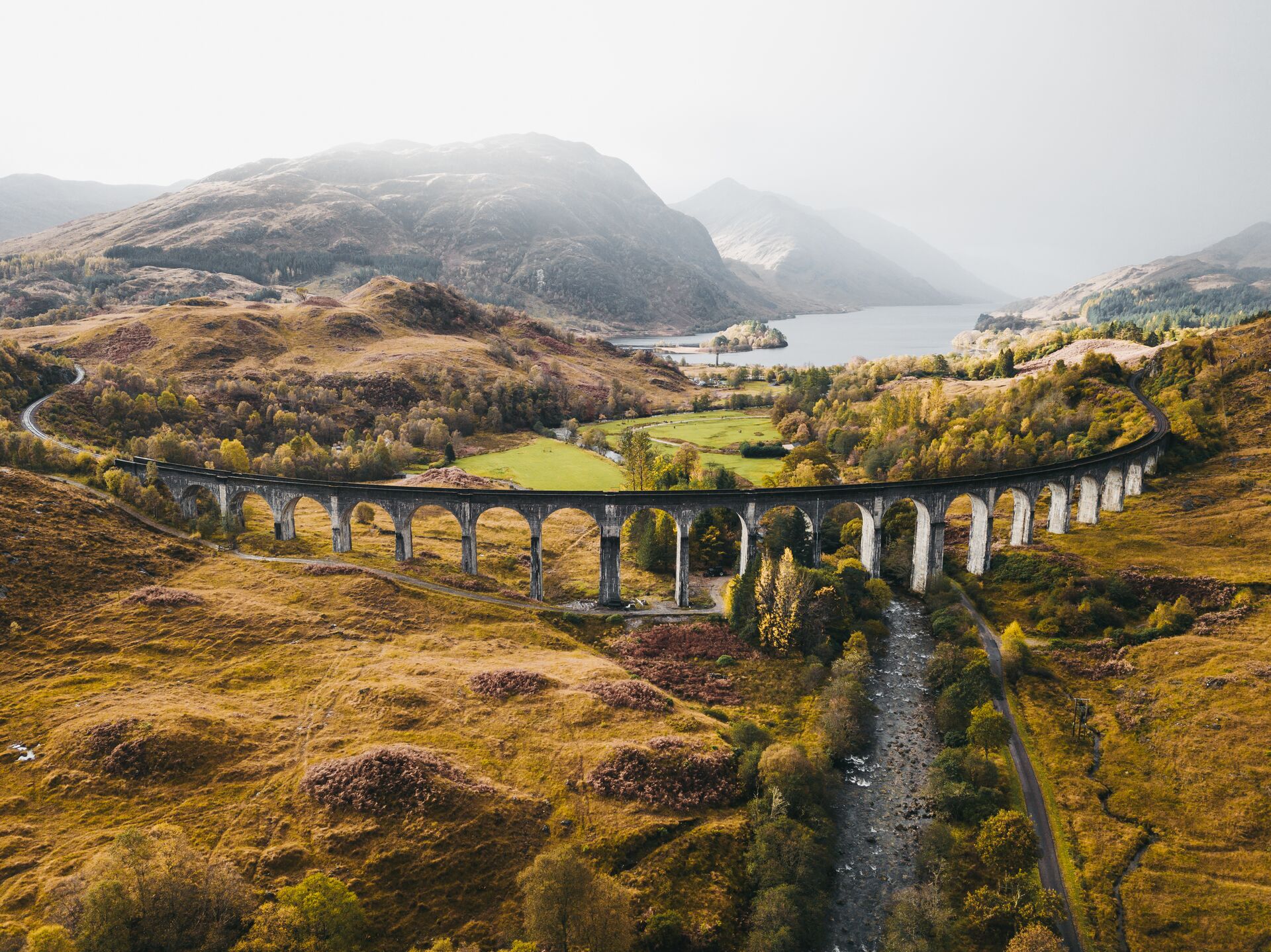 image of Highlight Jacobite Steam Train crossing Glenfinnan Viaduct Scotland tours 
