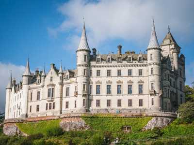 Imposing bright towers of Dunrobin Castle on a sunny day