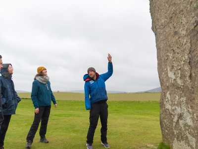 Highland Explorer Tours Guide providing commentary at Stones of Stennes