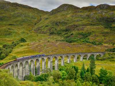 Scotrail train crossing the Glenfinnan Viaduct on West Highland Line