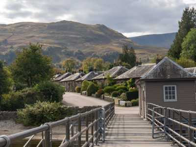 Conservation Village of Luss with traditional stone houses on a sunny day 